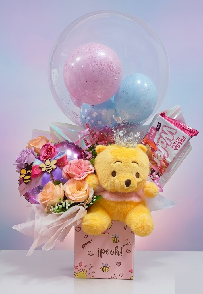 Adorno con Winnie Pooh y rosas pastel